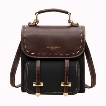 Petit sac à dos vintage noir et marron avec un fond blanc