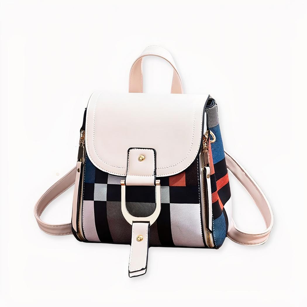 Un petit sac à dos vintage multicolore, à la fois vintage et moderne. Les motifs de ce sac sont des jeux de carrés de couleurs qui font penser au design Mondrian. Un sac définitivement mode et pratique.