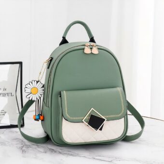 Sac à dos en simili cuir bijou pâquerette vert avec un détail une fleur avec un cadre