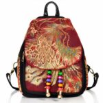 Sac à dos vintage femme à paillettes marron avec un fond blanc