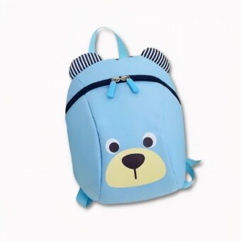 Sac à dos ourson pour enfants rouge avec un fond un mur blanc,