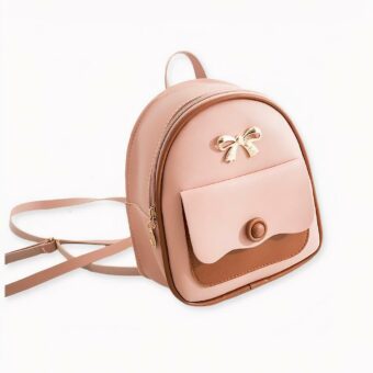 mini sac à dos multifonctionnel rose et marron sur fond gris clair.