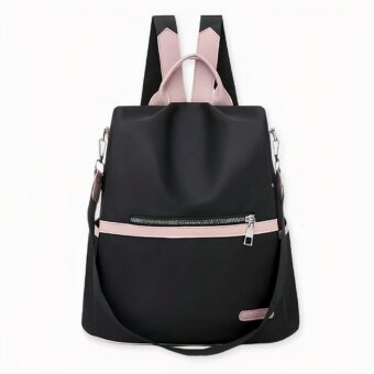 Sac à dos rose et noir waterproof en oxford sur fond gris clair.