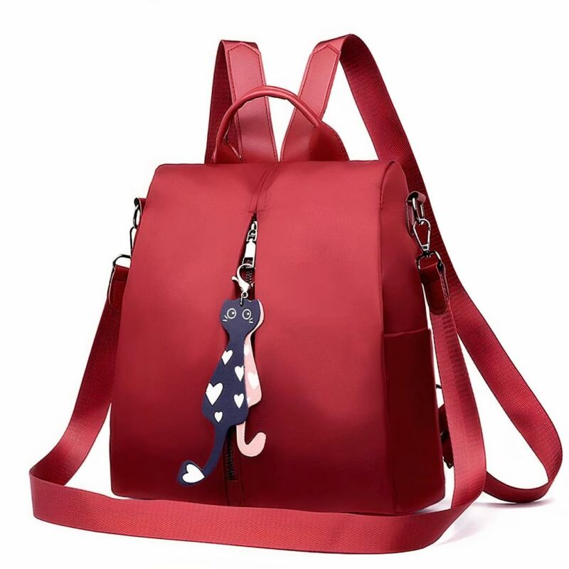 Sac à dos Oxford avec pendentif pour femme rouge avec un fond blanc