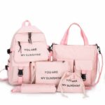 Ensemble de sac à dos en toile pour adolescentes et femmes rose avec un fond blanc