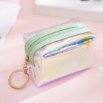 Porte monnaie couleur holographique avec un fond rose