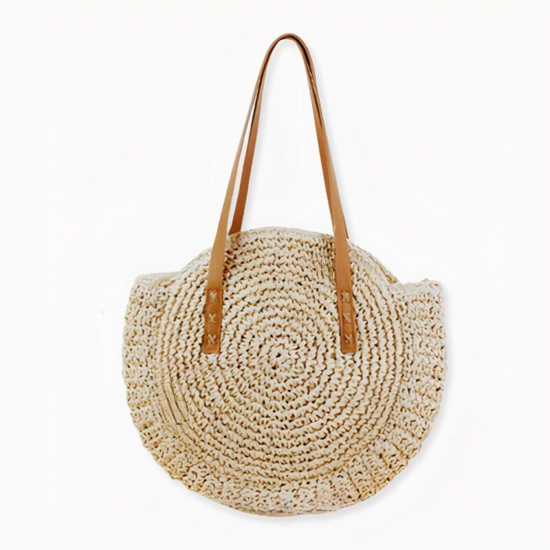 Envie d'un sac pratique et élégant pour aller à la plage ? Voici notre superbe sac de plage en paille rond pour femme ! Son style bohème est parfait pour l'été et se marie facilement avec toutes sortes de tenues estivales