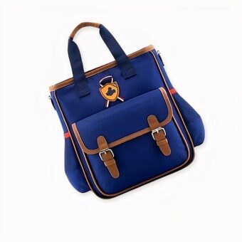 Sac à bandoulière bleu en toile avec logo Mickey pour enfant avec poche devant. Bonne qualité et très à la mode.