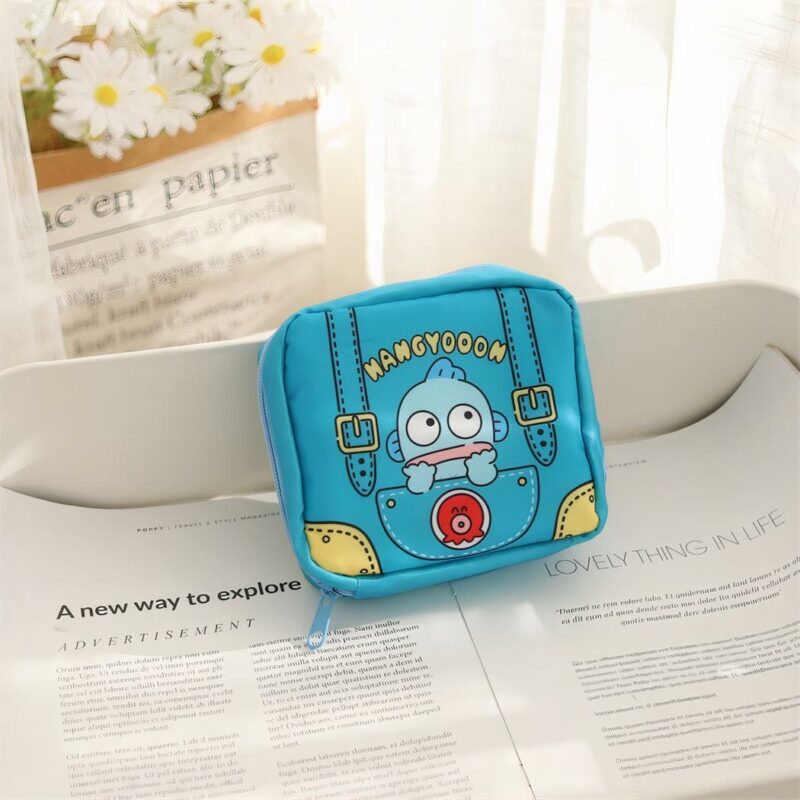 Sac de rangement serviettes hygiéniques pour femme bleu avec un fond un poster et un cadre