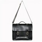 cartable noir en simili cuir pour homme, sur fond gris clair
