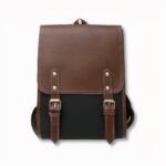 Sac à dos cartable style retro pour femme noir et marron en simili cuir, sur fond gris clair