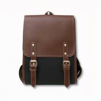 Sac à dos cartable style retro pour femme noir et marron en simili cuir, sur fond gris clair