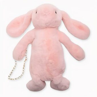Sac à dos en forme de lapin en peluche rose.