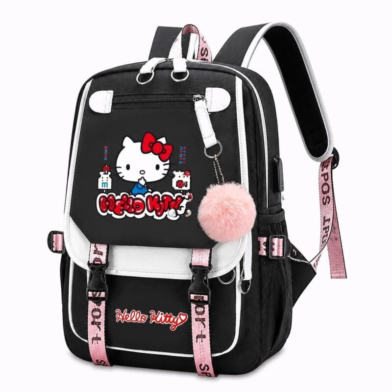 Un sac à dos Hello Kitty au style ultra tendance noir et blanc, avec un pompon rose, des sangles roses et le dessin de Hello Kitty sur le devant.